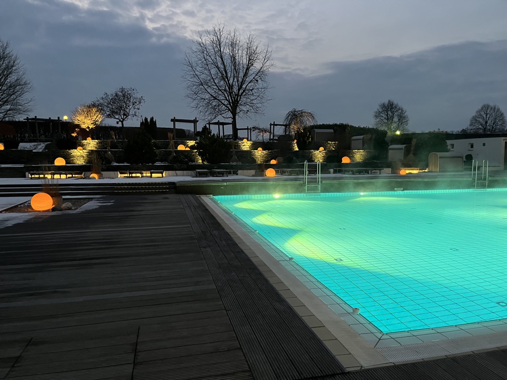 The outdoor pools by night.