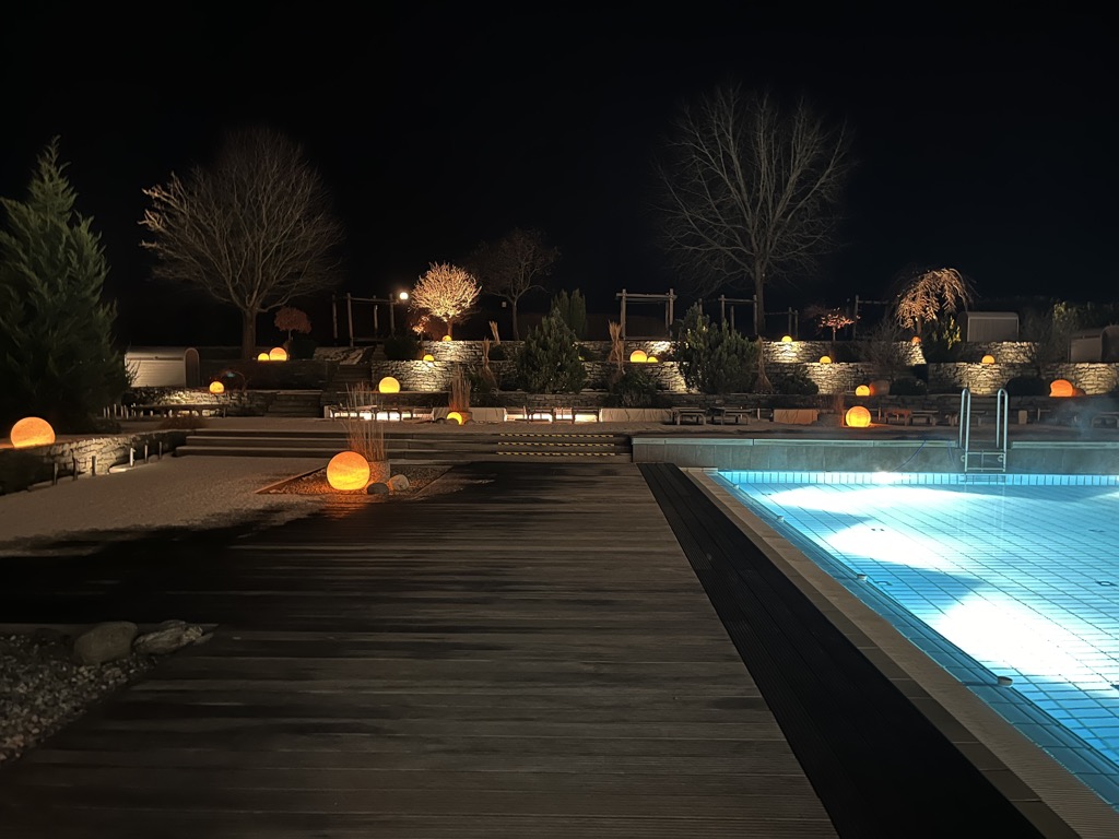 The outdoor pools by night.